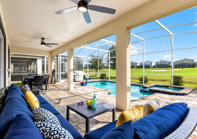 Enclosed lanai, saltwater pool and spa, 6 burner BBQ and view of the golf course from the outdoor sectional