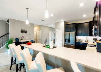 Kitchen with open floor plan with seating for 5 at breakfast bar
