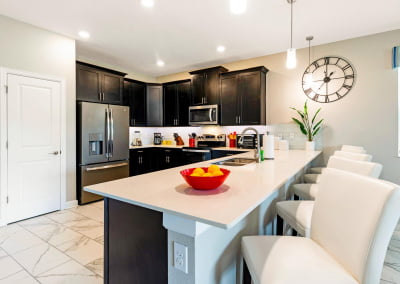 Kitchen with open floor plan with seating for 5 at breakfast bar