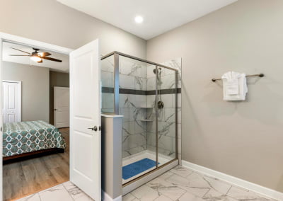 Primary bathroom has a free standing shower and soaking tub