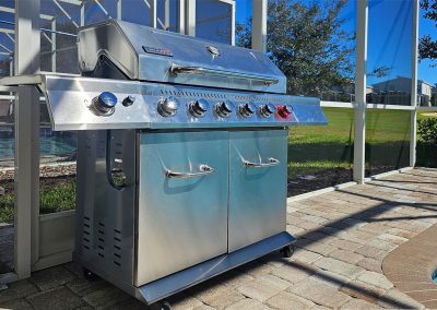 Large commercial 6 burner grill with propane included during your stay