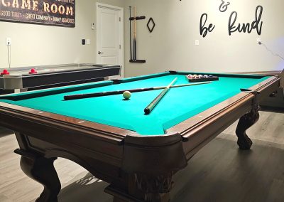 Professional 8 foot pool table in a climate controlled game room