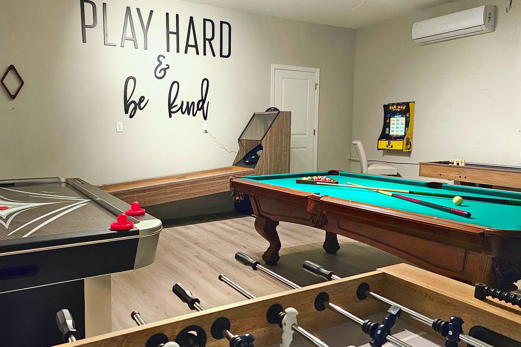 Climate controlled game room with pool table, air hockey, skeeball, shuffleboard and foosball