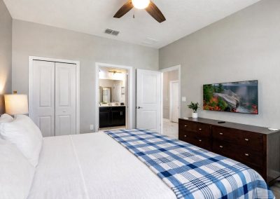 Champions Gate Spectacular vacation rental by owner Water King bedroom with 43 inch TV and en suite
