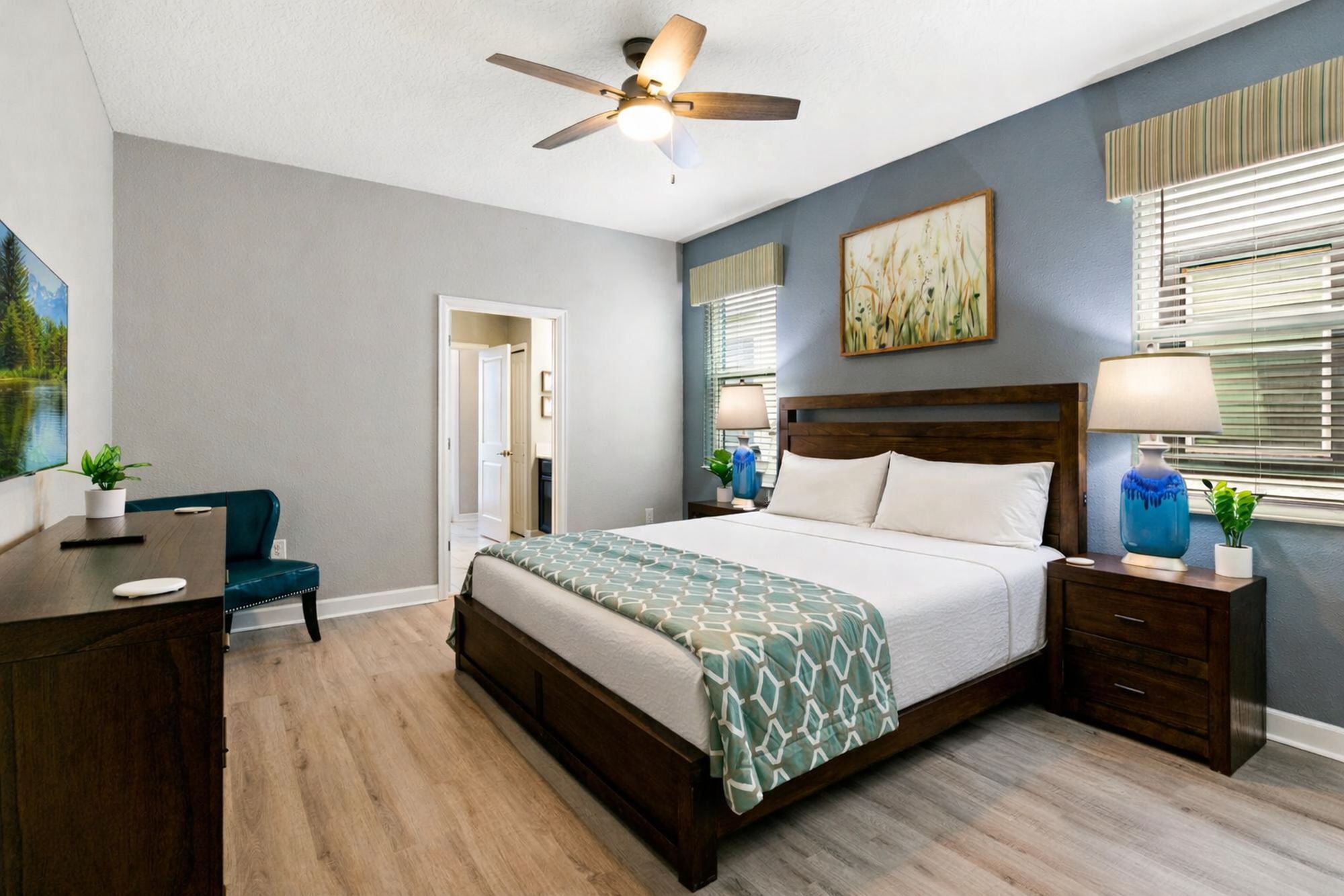 Champions Gate Spectacular vacation rental by owner Primary King bedroom with en suite and a door to lanai